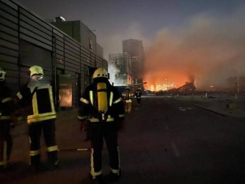 Rescuers eliminate a strong fire on the territory of one of the shopping centers in Podolsky district of Kyiv