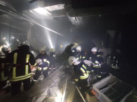 Rescuers eliminate a strong fire on the territory of one of the shopping centers in Podolsky district of Kyiv